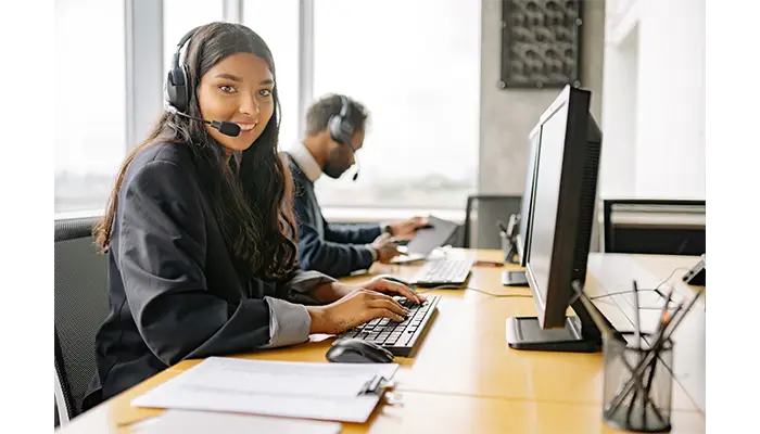 photo showing a customer support agent typing
