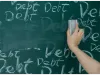 hand on white board erasing the word debt